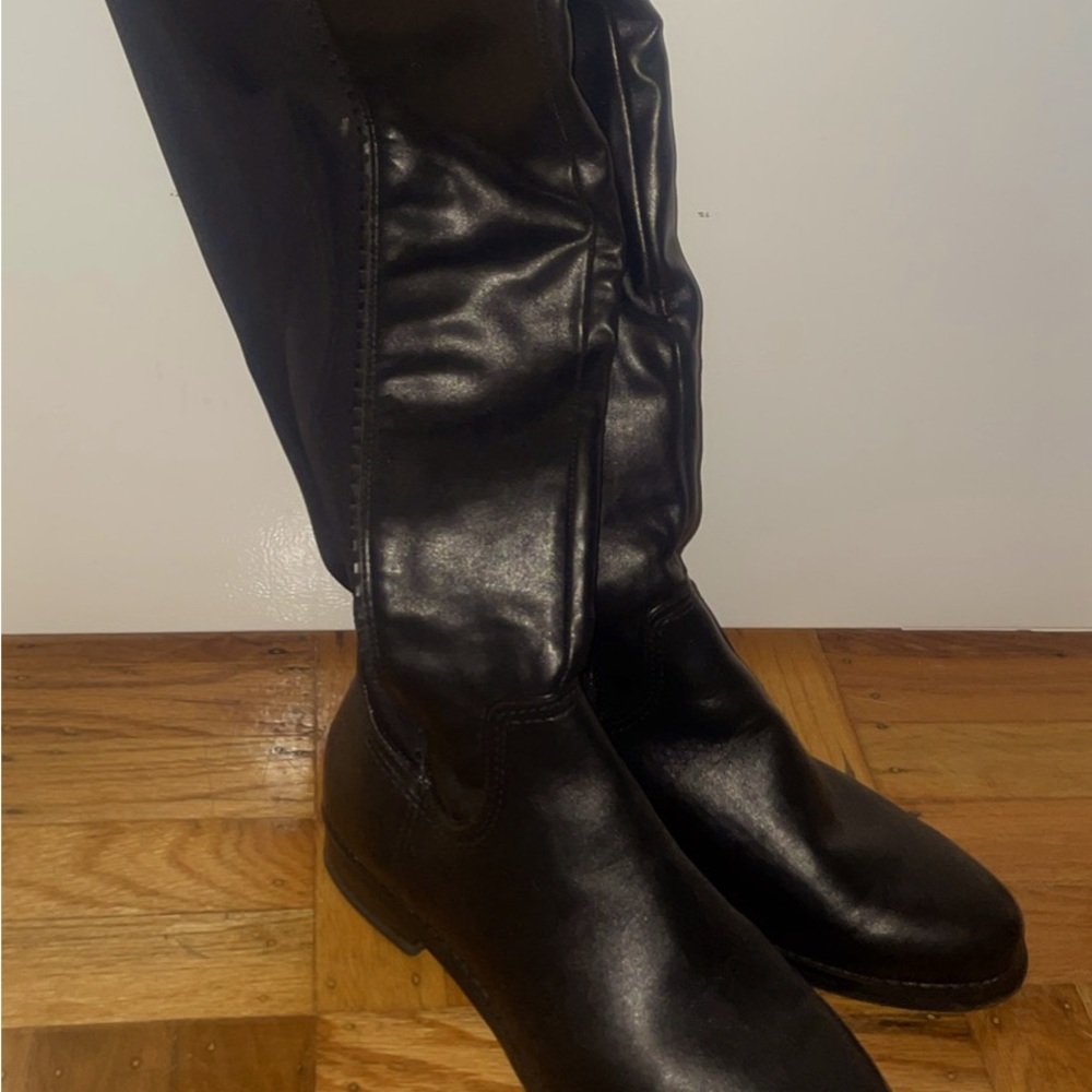 Stretchy leather knee high boots